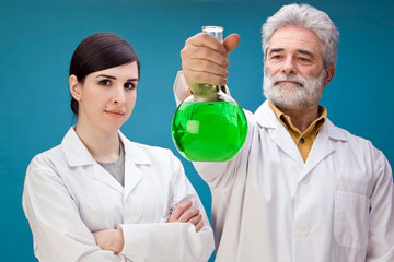 two chemical engineers conducting a chemistry experiment